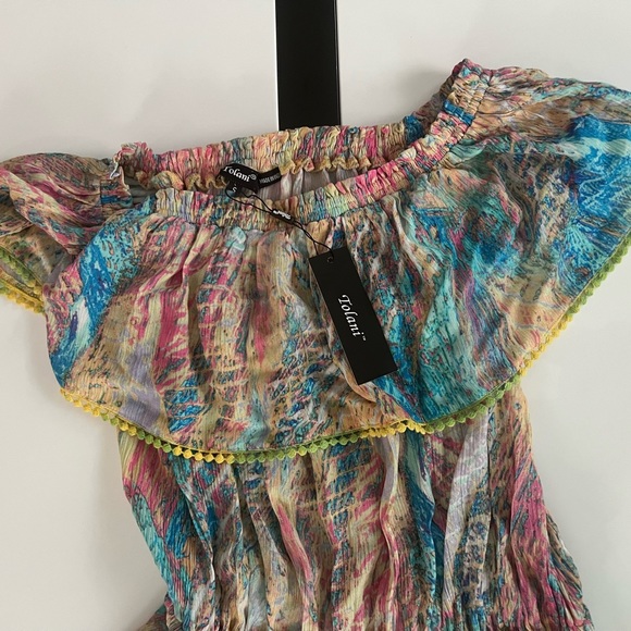 The “Radhi dress” in “splash” by Tolani. Size small. - Picture 5 of 13